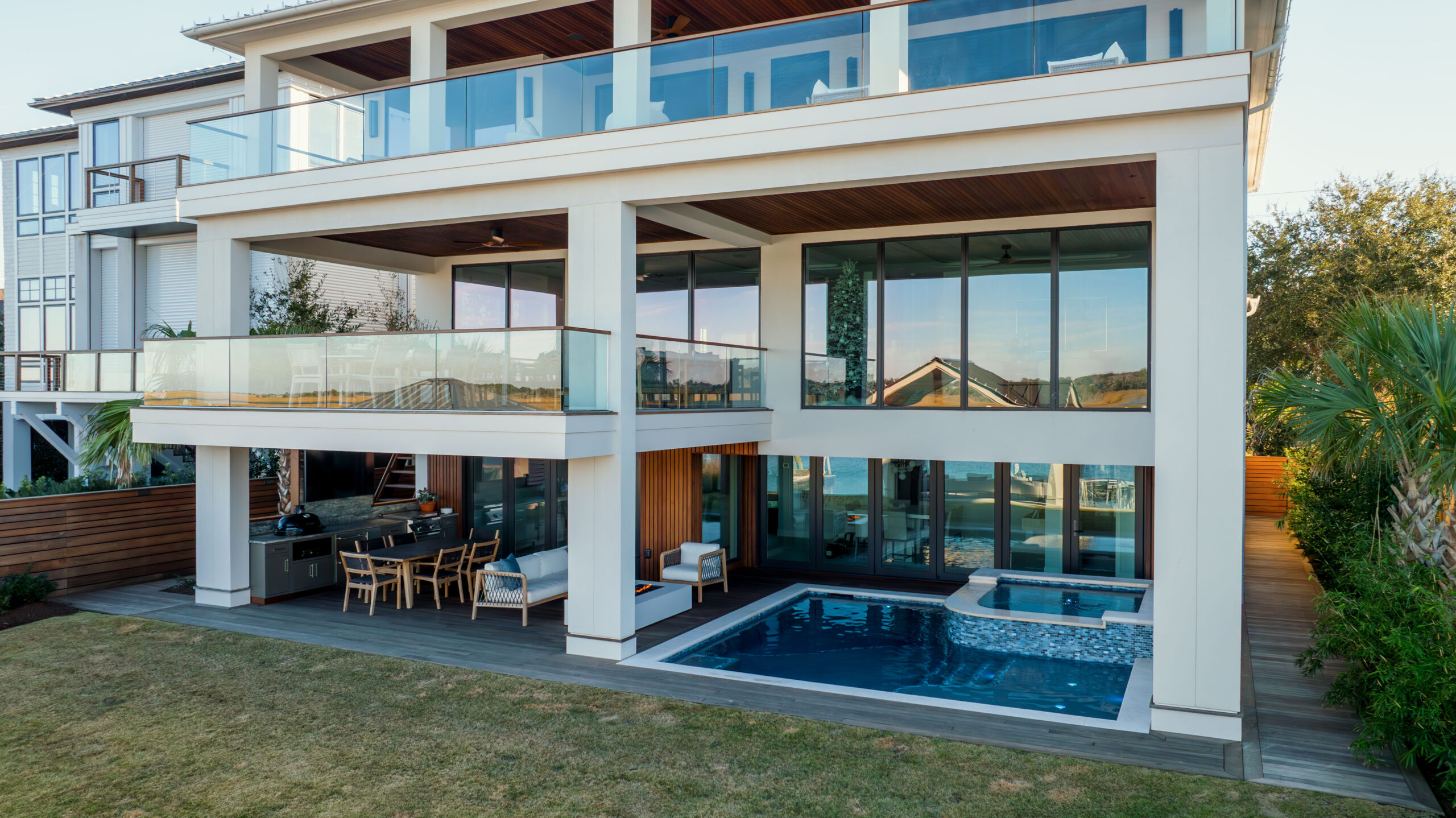 modern beach house with white metal and wood finishes