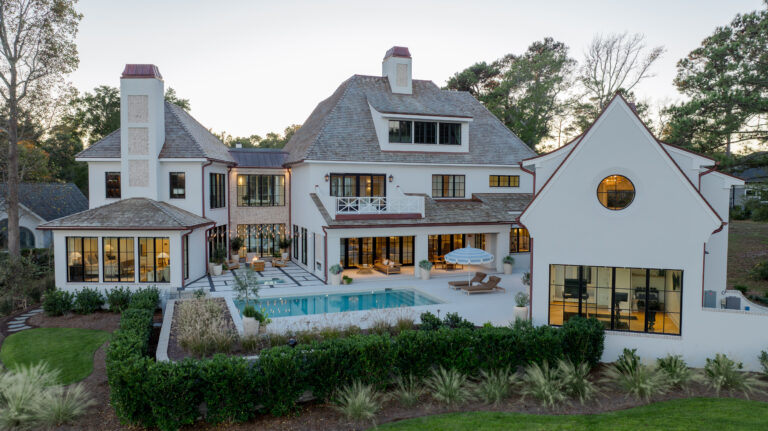 French country-inspired home in Wilmington, North Carolina overlooking the Dye golf course at the Country Club of Landfall.