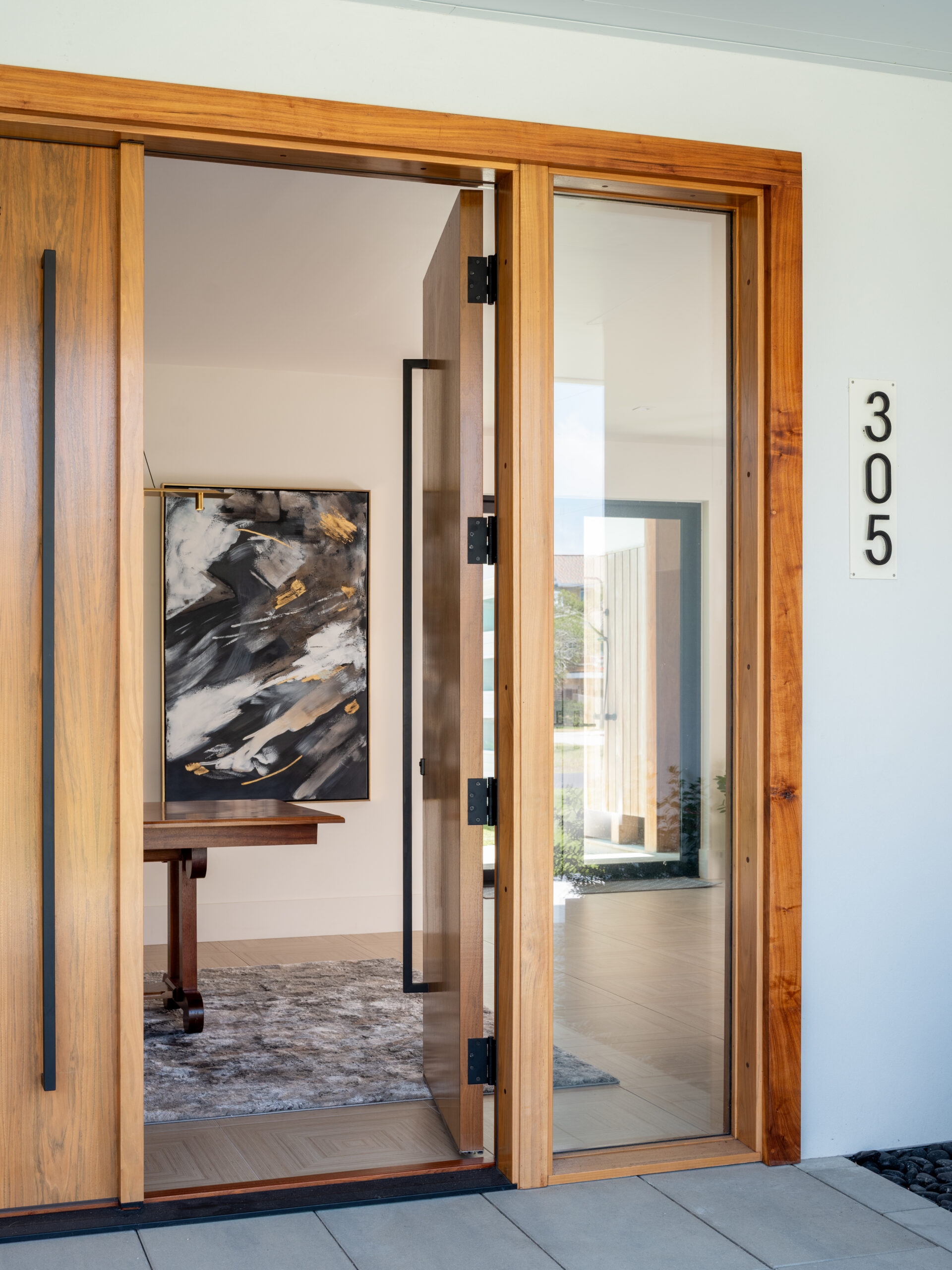 Entrance to 305 Alabama Avenue, a modern and coastal custom home built by Tongue & Groove in Carolina Beach, NC.